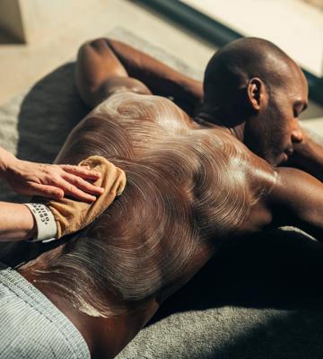 Hammam massage for man on massage table in luxury resort wellness ap at Camiral