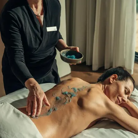 Body Ritual back massage for woman on massage bed at 5* resort in Spain