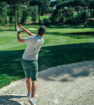 Golfer Playing from Bunker on Camiral Tour Course Hole 3 in Girona