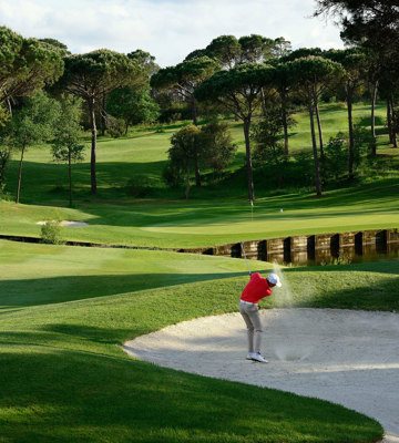 A Man Playing Golf at Camiral - Play Well