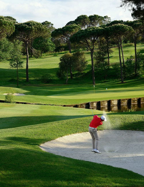 A Man Playing Golf at Camiral - Play Well