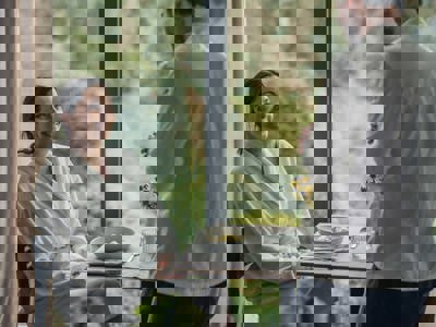 Woman enjoys rejuvenating meal at Camiral A Quinta do Lago Resort wellness spa