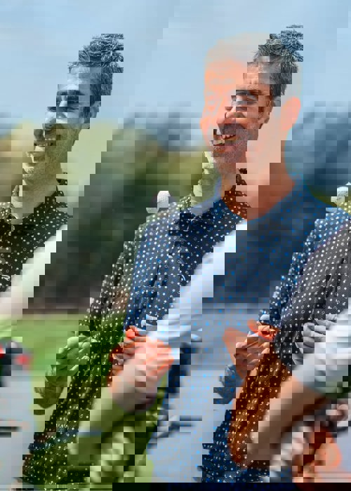 Golfers Enjoying a Round on Camiral Stadium Course Girona