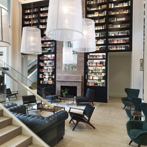 Communal modern sophisticated lounge with leather couches.