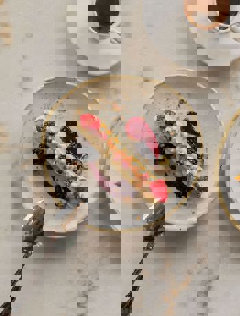 Gourmet Dessert with Fresh Berries and Espresso on Marble Table