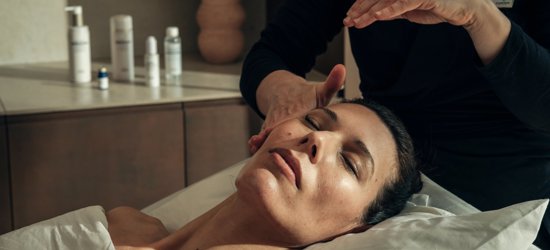 Facial massage for woman at 5* wellness centre spa at Camiral in Girona