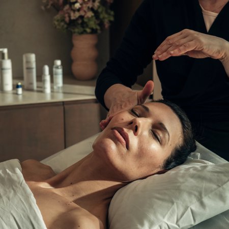 Facial massage for woman at 5* wellness centre spa at Camiral in Girona