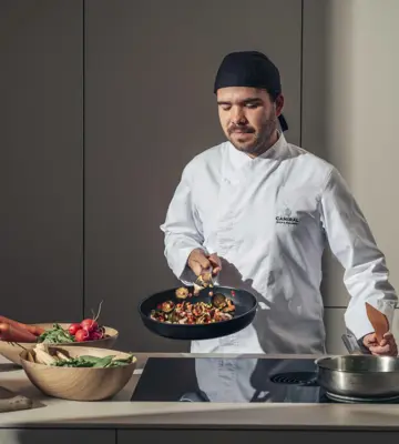 Camiral Wellness Kitchen cooking longevity dishes for health