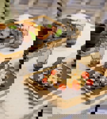 Grilled Sea Bass with Cherry Tomatoes and Potatoes Served at Camiral Bistro