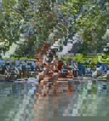 Couple Relaxing in Swimming Pool at PGA Catalunya Resort in Girona