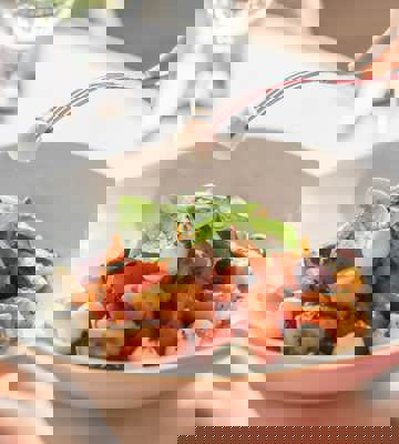 Fresh Mediterranean Salad with Tomatoes, Mozzarella and Olives at The Club Café