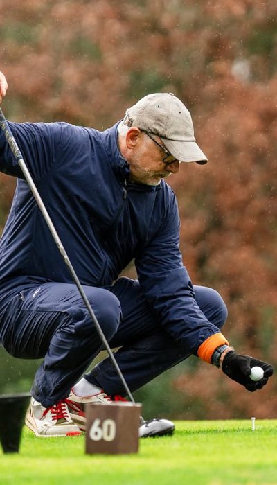 Golfer Lining up Putt at Camiral Golf Course in Girona