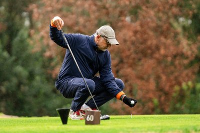 Golfer Lining up Putt at Camiral Golf Course in Girona