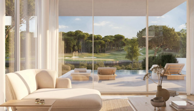 Modern Camiral suite interior with views of a private pool and golf course.
