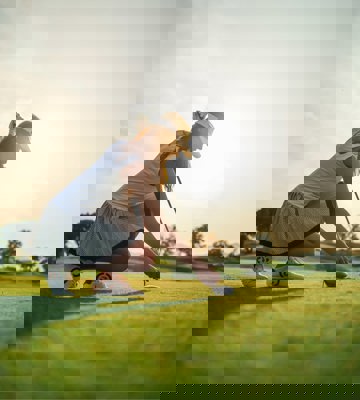 A Woman Playing Golf at Camiral in Spain - Elevated Golf Experience