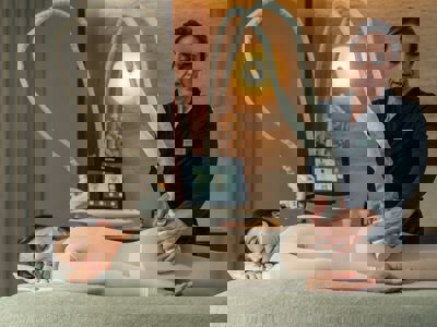 Icoone massage for woman in white body suit at the Camiral a Quinta de Lago Resort Girona