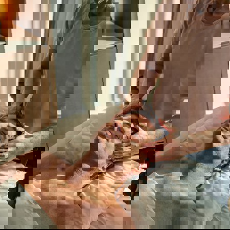 Man receiving massage facial in luxury elegance at the Camiral Resort in Girona