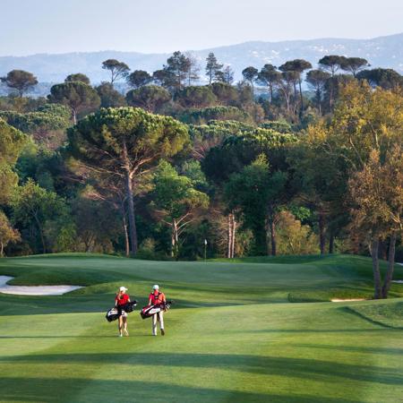 Golfers Walking Fairway at Camiral Girona