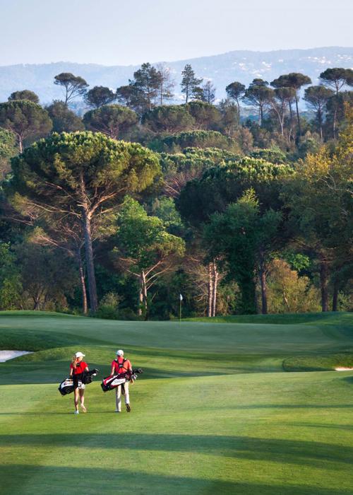 Golfers Walking Fairway at Camiral Girona