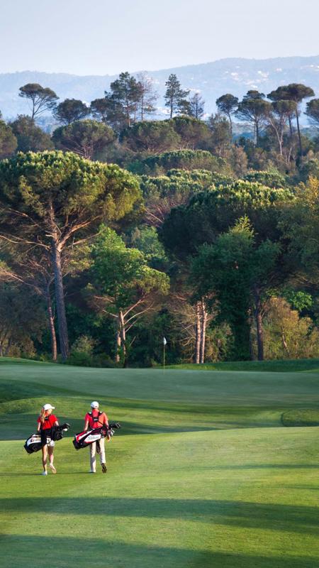 Golfers Walking Fairway at Camiral Girona
