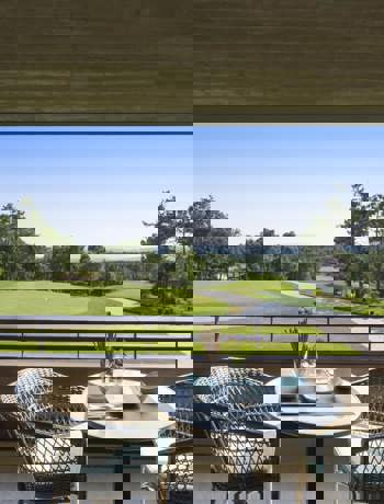 Outdoor Terrace Dining with Panoramic Golf Course Views at Camiral Resort