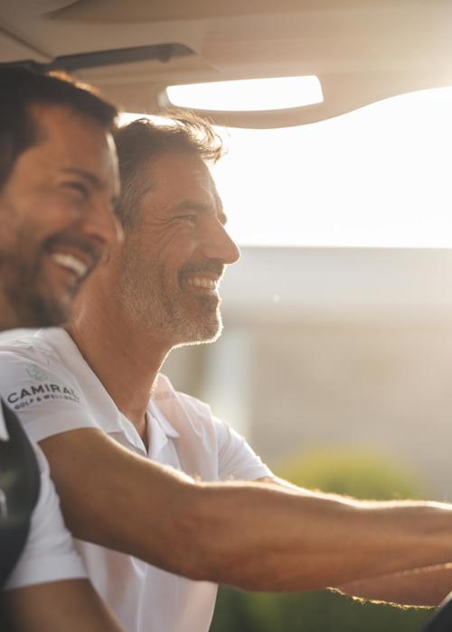 Friends Enjoying Golf Buggy Ride at Camiral Resort Girona