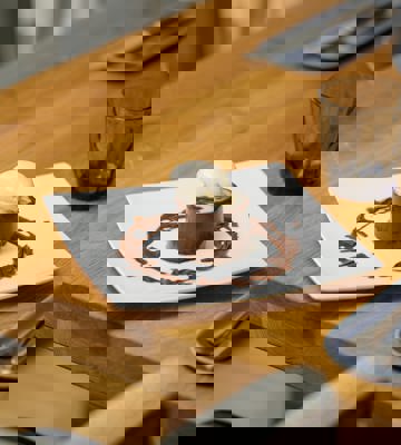 Chocolate Fondant Dessert with Vanilla Ice Cream Served at Camiral Bistro