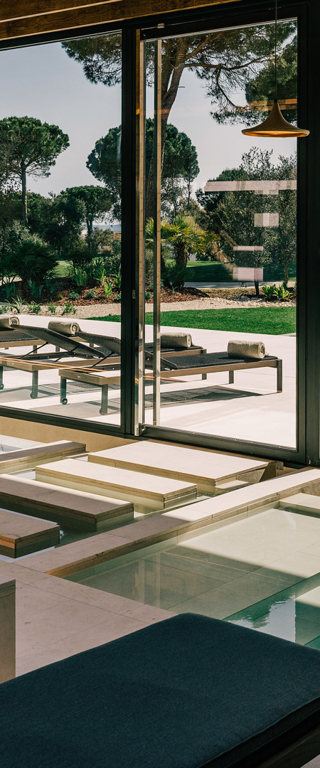 Relaxing thermal baths indoor and outdoor at luxury Camiral resort wellness spa in Catalunya