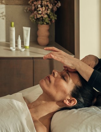 Woman receives facial massage at luxury 5* wellness spa in Spain